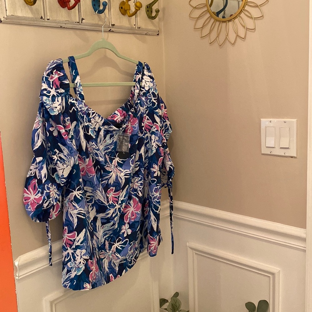New. Off the shoulder flower top